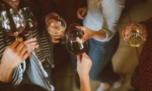 women holding wine