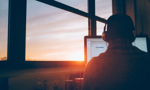 man at computer working